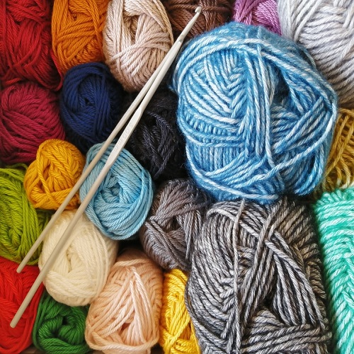 Knitting needles and colorful yarns